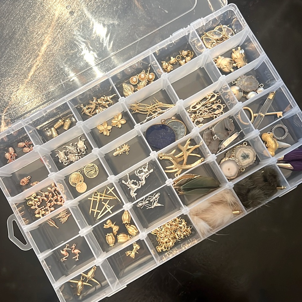 Over 100+ BRAND NEW CHARMS and box.